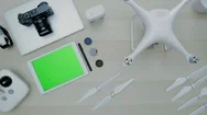 Top View Of Drone And Accessories Representing Workspace Of Professional Stock Footage
