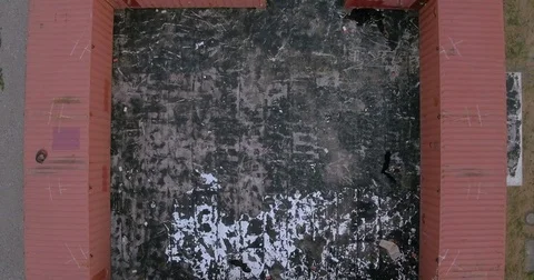 Top view with drone from building while spinning and zooming out 動画素材 70260169