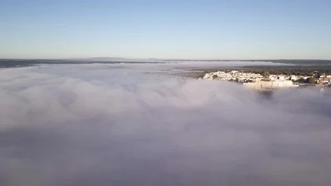 Top view from drone on cloud under which you can see old city. Fog above river Stock Footage 119180163