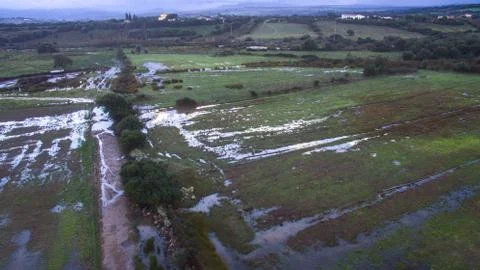 Top view with the drone of flooded fields and river overflowed after a severe Stock Photos