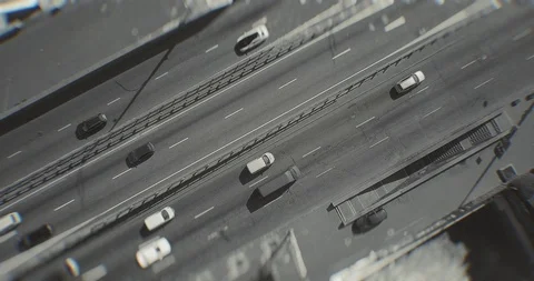 Top view of a drone flying on a freeway with cars on a sunny day. Stock Footage 127216339