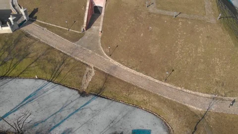Top view from Drone flying over the old beautiful castle near the river Stock Footage 126829320