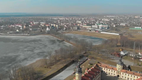 Top view from Drone flying over the old castle near the river Stock Footage 126829728