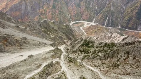 Top view drone footage flying over high peak in national reserve park. Stock Footage 125066997