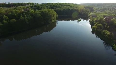 Top view of drone on lake with forest Stock Footage 75661416