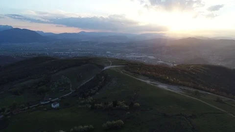Top view drone made 4k video of countryside road meadow with trees around Stock Footage 74568420