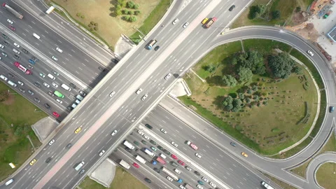 Top view from drone on overpass and road traffic. Intersection in real speed. Stock Footage 139886911