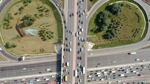 Top view from drone on overpass with road traffic. Summer time. Slow motion. Stock Footage 139778587