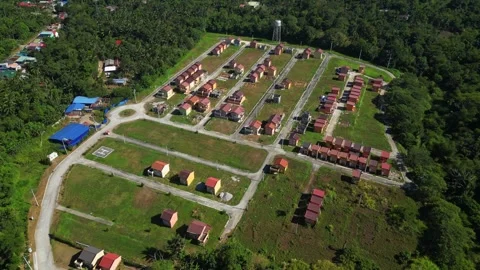 Top view drone shot capturing entire subdivision layout of Camella Homes Stock Footage 332925201