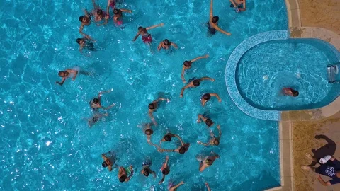 Top view drone shot of swimming pool in ... | Stock Video | Pond5
