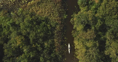 Top view drone shot of white canoe Stock Footage 221318879