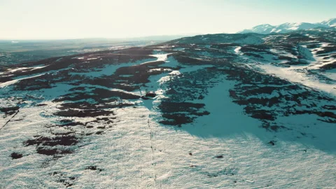 Top view drone video of snowy peaks and sunlight Stock Footage 236959226