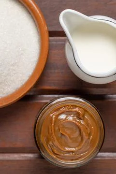 Top view of Dulce de leche, traditional sweet from Argentina with milk an s.. Photos