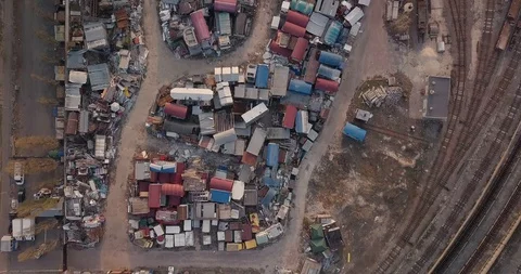 Top view of a dump of iron stalls at sunset Stock Footage 128658903