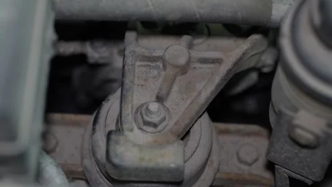 Top view of a dusty car engine mount rubber bushing. Vidéo 345911374