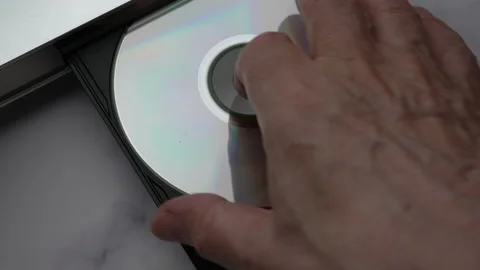Top View DVD Disc, Eject Tray And Extract Disc In DVD-player. Man Of Hand Remove 스톡 동영상 135603136