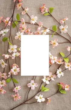 Top view of Easter background with blooming branches and greeting card. Stock Photos