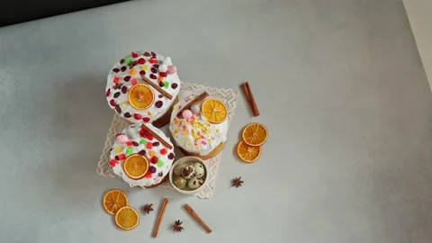 Top view of Easter Cakes decoreted with dried Fruits on Grey Background Stock Footage 236855410