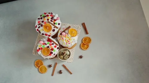 Top view of Easter Cakes decoreted with dried Fruits on Grey Background Stock Footage 236855413