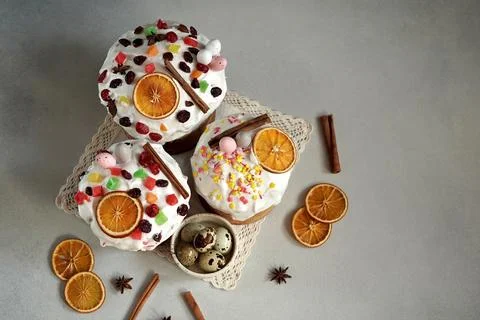 Top view of Easter Cakes decoreted with dried Fruits on Grey Background Stock Photos