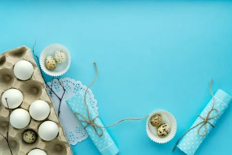 Top view easter composition on blue background with free and copy space Stock Photos