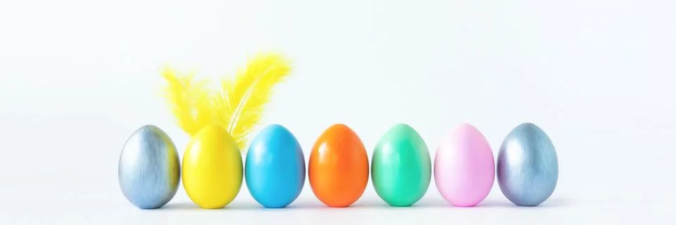 Top view of an easter composition of painted eggs in bright juicy colors on a Stock Illustration