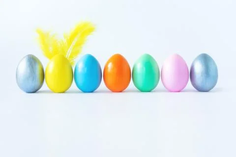 Top view of an easter composition of painted eggs in bright juicy colors on a Illustrazione stock