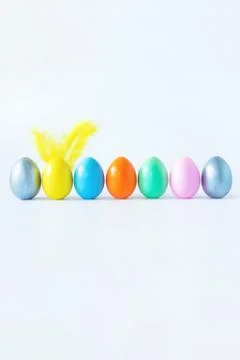 Top view of an easter composition of painted eggs in bright juicy colors on a Stock-Illustration