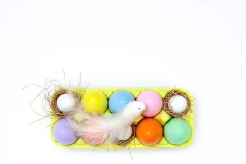 Top view of an Easter composition of painted eggs in bright juicy colors with Stock Photos
