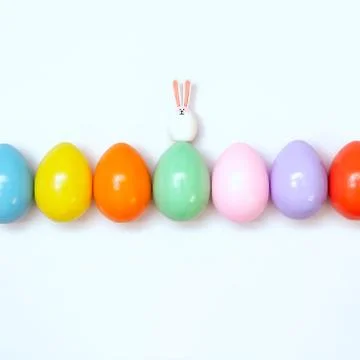 Top view of an Easter composition of painted eggs in bright juicy colors on a Stock Photos
