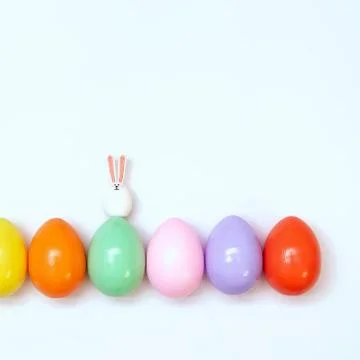 Top view of an Easter composition of painted eggs in bright juicy colors on a Stock Photos