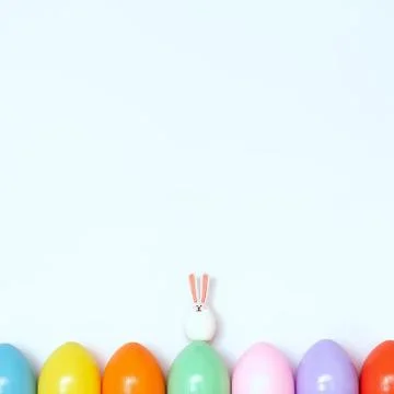 Top view of an Easter composition of painted eggs in bright juicy colors on a Stock Photos