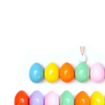 Top view of an Easter composition of painted eggs in bright juicy colors on a Stock Photos