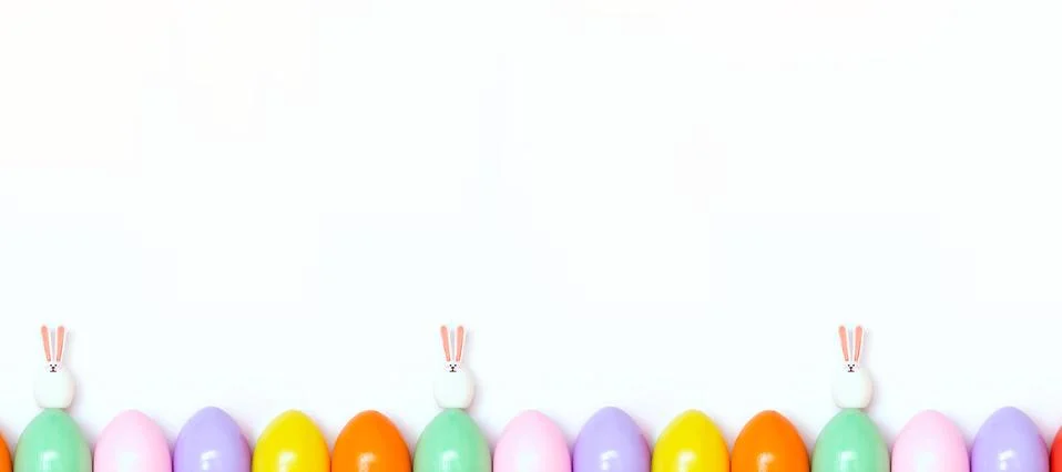 Top view of an Easter composition of painted eggs in bright juicy colors on a Stock Photos