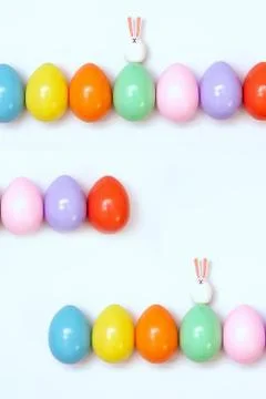 Top view of an Easter composition of painted eggs in bright juicy colors on a Stock Photos