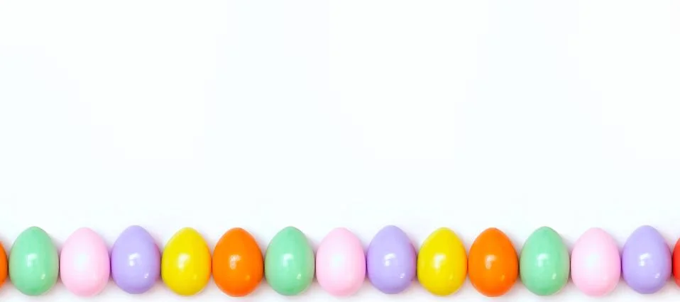 Top view of an Easter composition of painted eggs in bright juicy colors on a Stock Photos