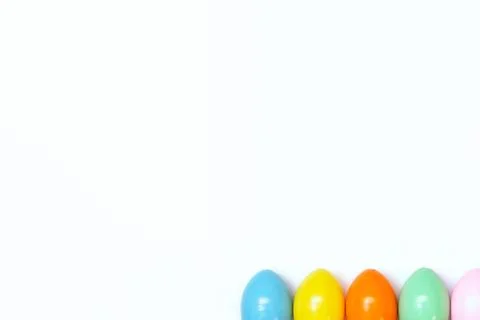 Top view of an Easter composition of painted eggs in bright juicy colors on a Stock Photos