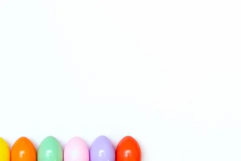 Top view of an Easter composition of painted eggs in bright juicy colors on a Stock Photos