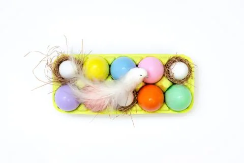 Top view of an Easter composition of painted eggs in bright juicy colors with Stock Photos