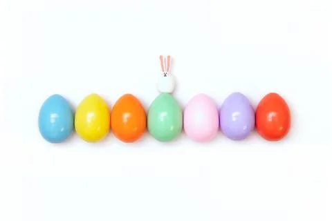 Top view of an Easter composition of painted eggs in bright juicy colors on a Stock Photos