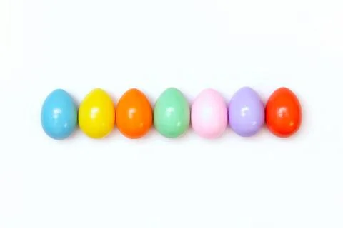 Top view of an Easter composition of painted eggs in bright juicy colors on a Stock Photos
