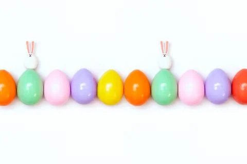 Top view of an Easter composition of painted eggs in bright juicy colors on a Stock Photos