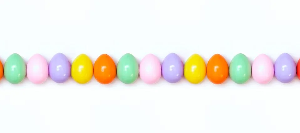 Top view of an Easter composition of painted eggs in bright juicy colors on a Stock Photos