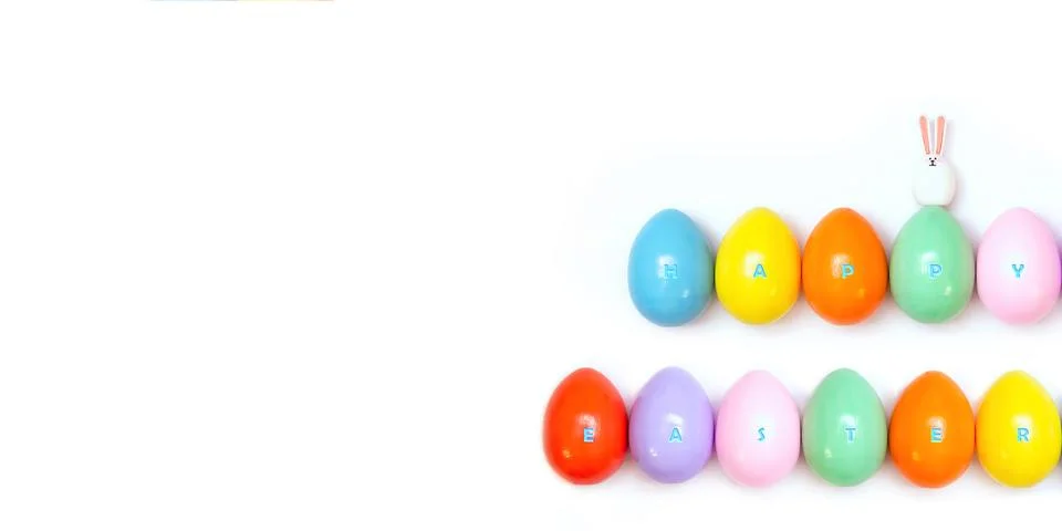 Top view of an Easter composition of painted eggs in bright juicy colors on a Stock Photos