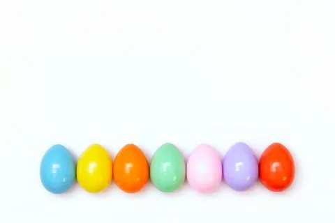Top view of an Easter composition of painted eggs in bright juicy colors on a Stock Photos