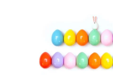 Top view of an Easter composition of painted eggs in bright juicy colors on a Stock Photos