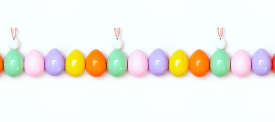 Top view of an Easter composition of painted eggs in bright juicy colors on a Stock Photos