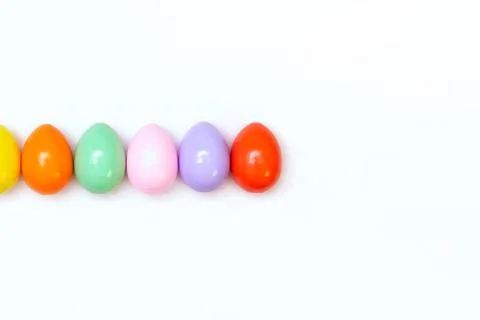 Top view of an Easter composition of painted eggs in bright juicy colors on a Stock Photos