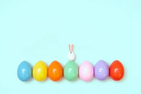 Top view of an Easter composition of painted eggs in bright juicy colors on a Stock Photos