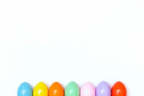 Top view of an Easter composition of painted eggs in bright juicy colors on a Stock Photos